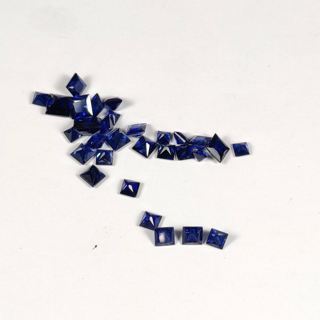 1.9-3.9 MM Natural Princess Cut Blue Sapphire - Thai Gems Export Ltd.