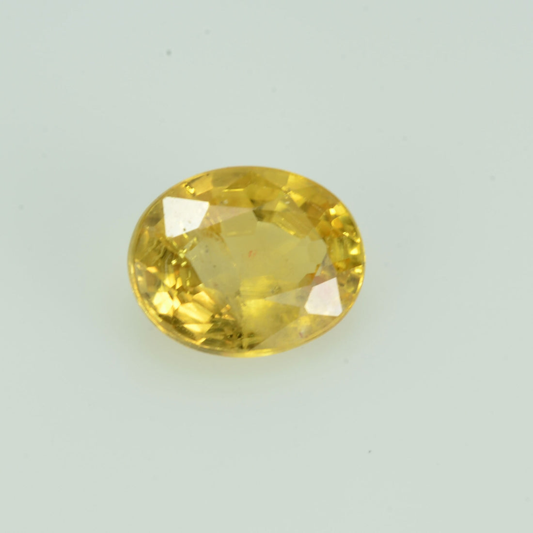 0.66 cts Natural Yellow Sapphire Loose Gemstone Oval Cut