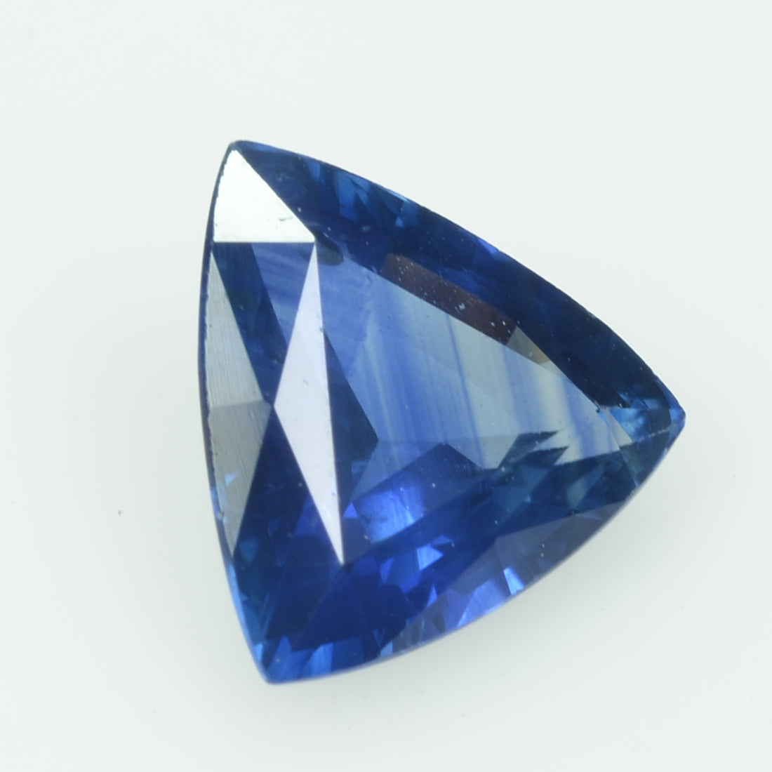 1.22 Cts Natural Blue Sapphire Loose Gemstone Trillion Cut - Thai Gems Export Ltd.